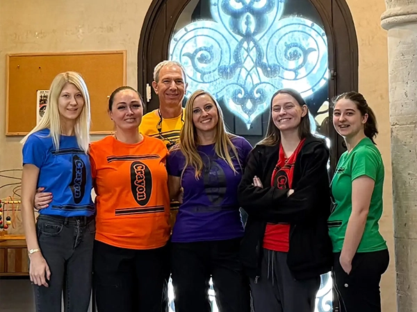 Orthodontist Shawn Bader With Team In Crayola Shirts