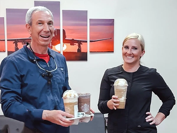 Orthodontist Shawn Bader With Staff Member
